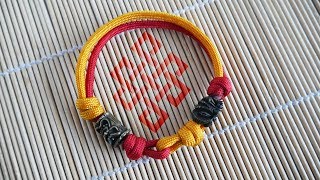 How to Make a Two Color Beaded Sliding Knot Paracord Bracelet Tutorial [upl. by Car615]