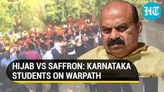 Hijab vs Saffron row swells in Karnataka Congress demands colleges to be shut down [upl. by Nnylatsyrk]