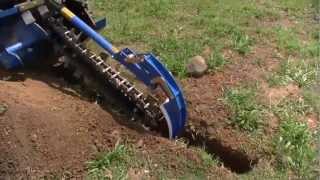 Auger Torque MT900 Trencher on Kubota SVL75 [upl. by Zetes]