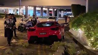 3Feb2019 SE80S Ferrari 488 GTB accident outside Pan Pacific Singapore Hotel [upl. by Enalahs]