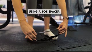 Using a toe spacer or separator For feet pain [upl. by Enylecoj]