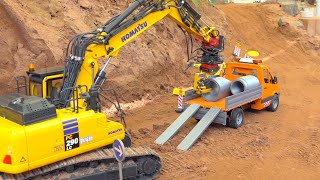 SPECIAL RC CONSTRUCTIONSITE MOMENTS RC KOMATSU PC 290 FUMOTEC LAY PIPES INTO THE GROUND [upl. by Elocaj]