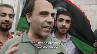 Libyans in Tunisia react to reports of Muammar Gaddafis death [upl. by Velick]