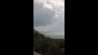 Waterspout Seen off Sicily During Wave of Bad Weather in Italy [upl. by Aleemaj168]