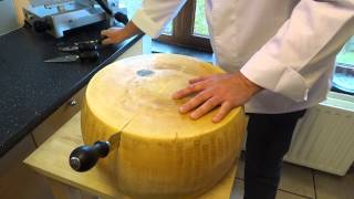 opening a wheel of parmesan cheese parmigiano reggiano [upl. by Brandyn67]