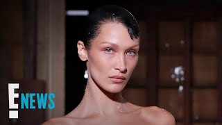 Bella Hadid Has Dress SPRAYPAINTED ON During Runway Show  E News [upl. by Rivkah]