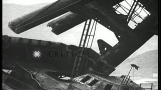 Men work removing the foremast of USS Arizona at Pearl Harbor Hawaii United StaHD Stock Footage [upl. by Susi375]