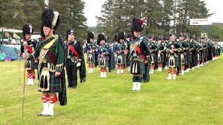 Chieftain leads the parade with Pipe Bands into the 2019 Tomintoul Highland Games in Moray Scotland [upl. by Ronnoc]