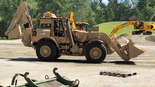 High speed HMEE military backhoes perform with JCB Dancing Diggers [upl. by Chao799]