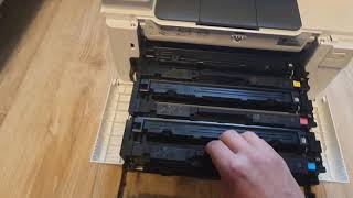 How to remove toner cartidge HP M180 M180n M181 M181FW [upl. by Emoraj]