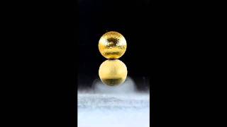 Liquid oxygen attracted by levitating magnet spheres [upl. by Kalman]