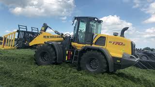 Silage Clamping with NEW HOLLAND W170D Stage V wheel loader with joystick steering [upl. by Nyrad927]