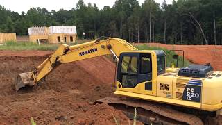 Komatsu PC220 LC8 Excavator Loading Dirt [upl. by Meraree327]