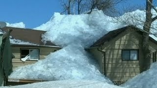 Ice Tsunami Video Photos Wall of Ice Rises Out of Lake Destroys Homes [upl. by Enneyehc]