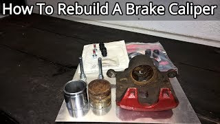 How To Rebuild A Front Brake Caliper  Complete Guide [upl. by Reddy]