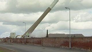 Demolition footage Eightyearold boy blows up chimney [upl. by Ylus]