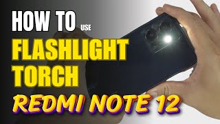 How to turn on Flashlight  Torch on Redmi note 12 [upl. by Elleinod]