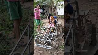 Kanika drives a recycling truck across a wooden bridge built by Mr Chenda short [upl. by Anawek]