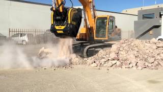 Crushing granite in Namibia with the BF903 crusher bucket [upl. by Macilroy735]