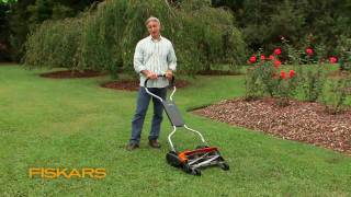 Fiskars Momentum The EcoFriendly Push Reel Lawn Mower [upl. by Anirtac]