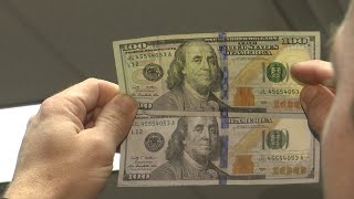 WEB EXTRA Comparing a fake and real 100 bill [upl. by Robbi]