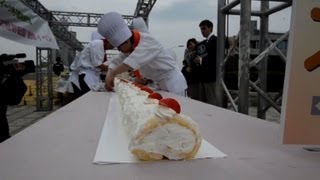 Students make the worlds longest roll cake [upl. by Odrawde]