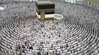 Thousands of Muslim worshippers perform prayers around the Kaaba [upl. by Gabrila436]