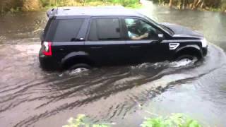 Freelander 2 driving in deep water [upl. by Yenitirb]