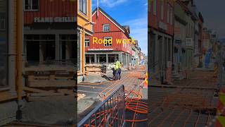 Workers install pipes for water to heat the sidewalks in winter shorts peopleroadwork norway [upl. by Erdnaxela713]