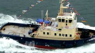 Svitzer Leixoes Tug Boat doing donuts at Lisbon Portugal alongside the Azura at Sailaway May 2010 [upl. by Ancell665]