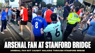 Arsenal fan BUMPS into Chelsea fans on the street [upl. by Oicneserc]