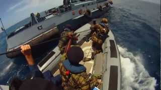 Mozambique Soldiers Board Suspected Pirate Ship at Sea  Somali Pirates [upl. by Elag987]