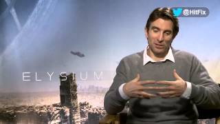 Sharlto Copley talks about how he builds his over the top character in Blomkamps Elysium [upl. by Asilenna]