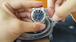 AP Royal Oak 15450 blue setting the time [upl. by Nylecyoj]