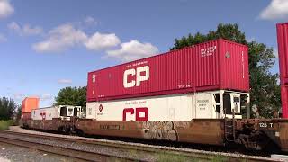 CPKC CP 118 with KCS 4772 mid DPU passing Osler [upl. by Notecnirp]