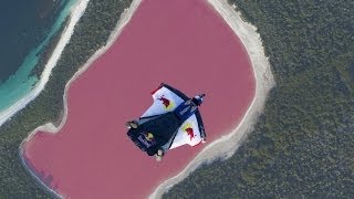 Wingsuit flying over a pink lake in Australia [upl. by Harlow]