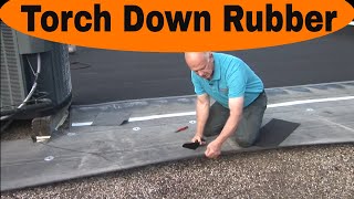 TORCH DOWN RUBBER ROOF Installation over Tar and Gravel explained [upl. by Payne958]