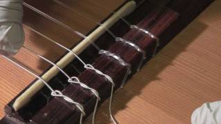 How to restring a classical guitar [upl. by Eemak904]