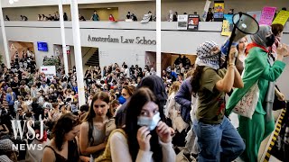 Police Beat Clash With Protesters at University of Amsterdam  WSJ News [upl. by Dyun]