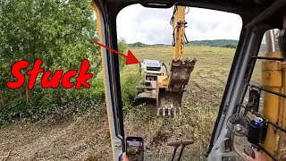 Case 140 Excavator put to the test cutting some crazy Brush because Aaron is stuck in the mud [upl. by Spiegel949]