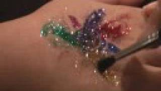 Glitter Tattoo Lesson 1 PaintOn Basics Sun Design [upl. by Morvin]