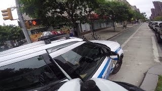 NYPD doors cyclist in protected bike lane crosswalk [upl. by Evers]