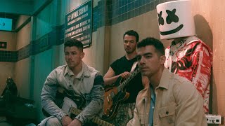 Marshmello x Jonas Brothers Leave Before You Love Me Behind The Scenes [upl. by Aicnelev940]