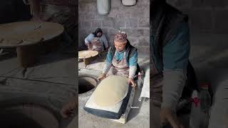 Baking the first Lavash bread in the traditional oventonir [upl. by Revilo109]