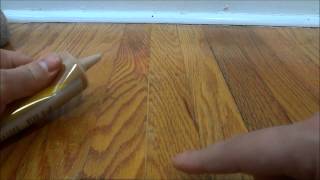 How To Fill In Gaps Between Hardwood Flooring With Wood Filler [upl. by Jorry]