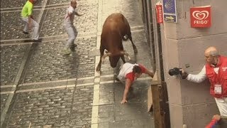 Pamplona Attack Watch as bull gores three runners [upl. by Grekin622]