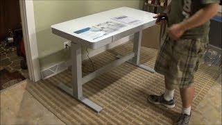 Tresanti Adjustable Height Motorized Standing Desk CostCo SKU 1074719 [upl. by Ahsuatan476]