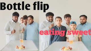 Bottle flips challenge and eating sweet [upl. by Florinda]