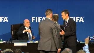 Sepp Blatter showered with dollar bills during FIFA press conference [upl. by Yahsan]