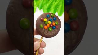 Lotte choco pie cake with small choco beans popsicle shortschocolate ytshorts [upl. by Atsillac]